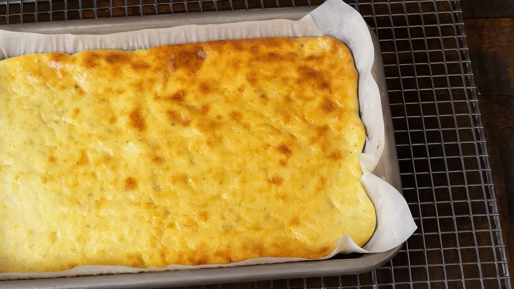 Cottage Cheese Flatbread Recipe golden-baked and cooling on a parchment-lined tray with smooth surface and light browning for GLP-1-friendly meals