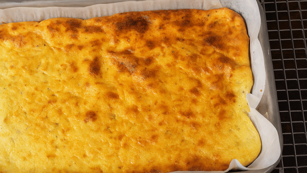 Cottage Cheese Flatbread Recipe baked golden and ready for slicing on parchment paper for a GLP-1-friendly meal