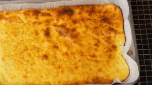 Cottage Cheese Flatbread Recipe baked golden and ready for slicing on parchment paper for a GLP-1-friendly meal